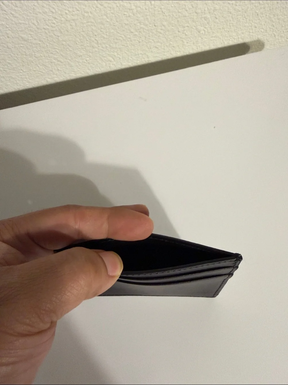 Gucci Black Leather Card Sleeve with Gold Logo Accent